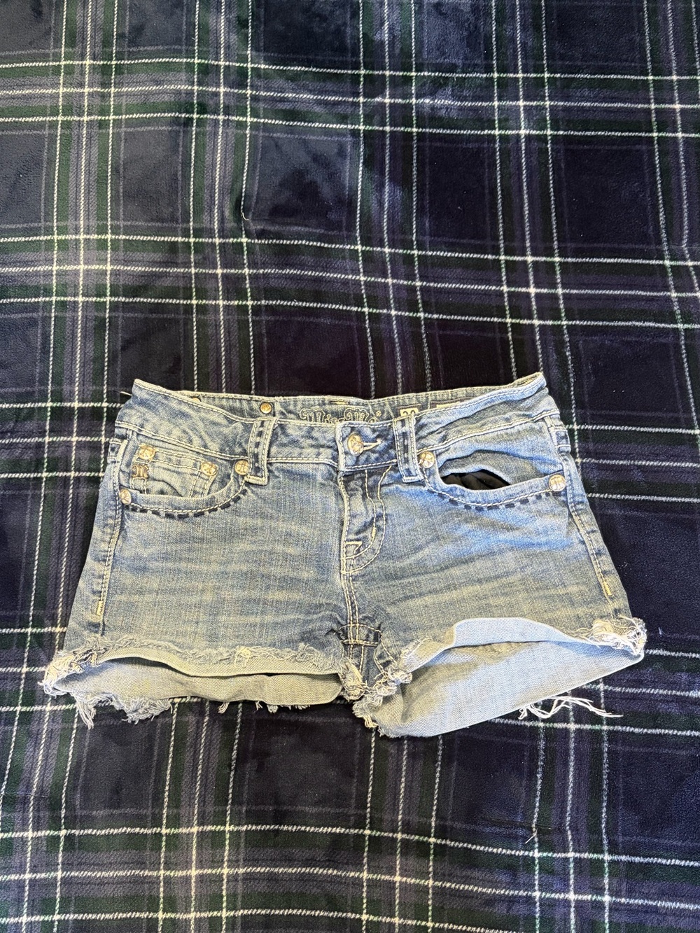 Miss Me denim shorts w/ embroidered bedazzled design on back pockets. Size 28.